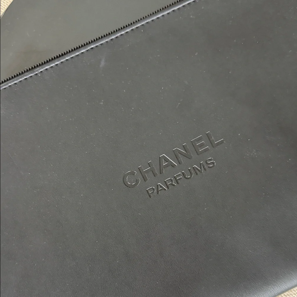 CHANEL Embossed Leather Toiletry Pouch